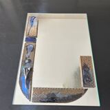Mirror with ceramic inclusion