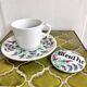 Antique herbal tea cup with mint infusion