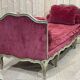 Louis XV style daybed in painted wood and covered with a red velvet
