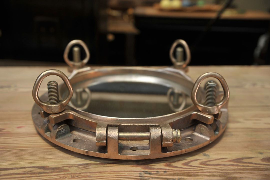 Bronze boat porthole mirror 1920 45x45cm