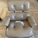 Armchairs and footrests by Charles & Ray Eames