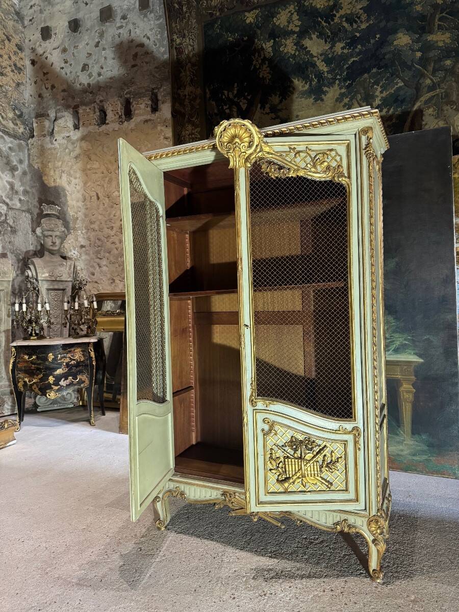 Bookcase in gilded wood and restored wood from the Napoleonic III period.