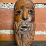 Moroccan mask in carved wood vintage decoration