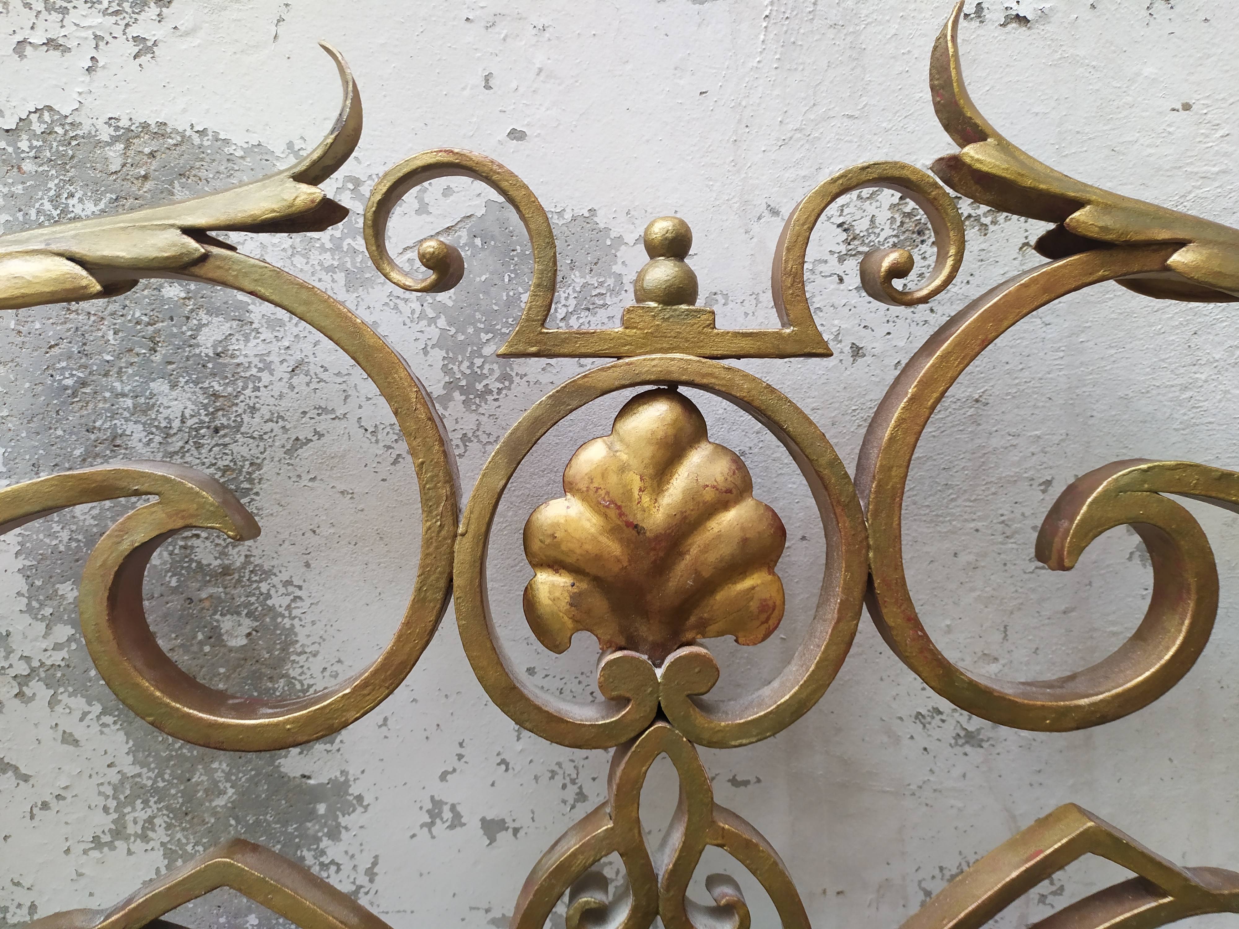 Golden wrought iron bedhead