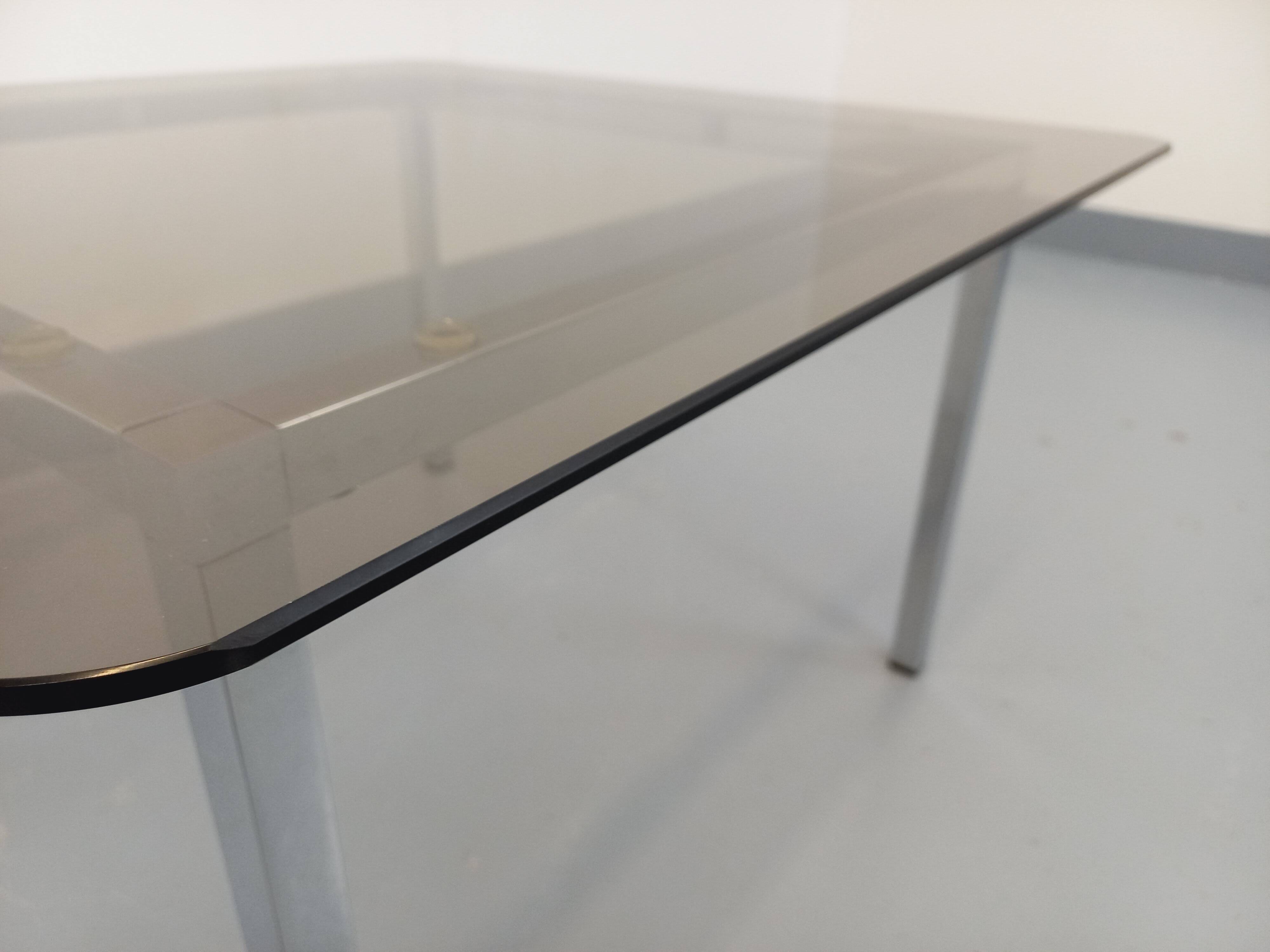 Vintage square coffee table in smoked glass and chrome metal from the 1970s.