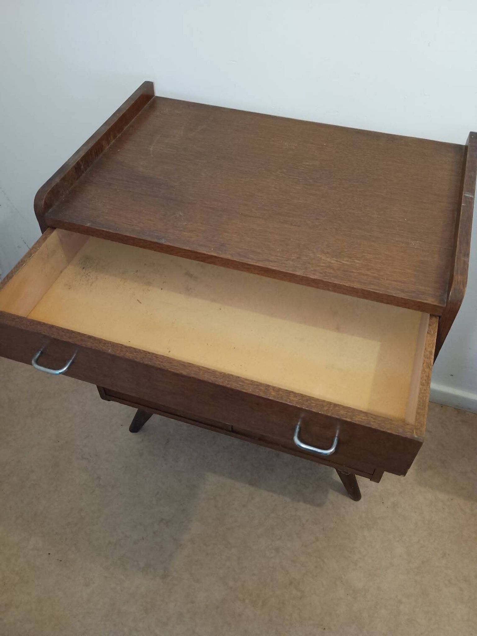 Compass leg chest of drawers