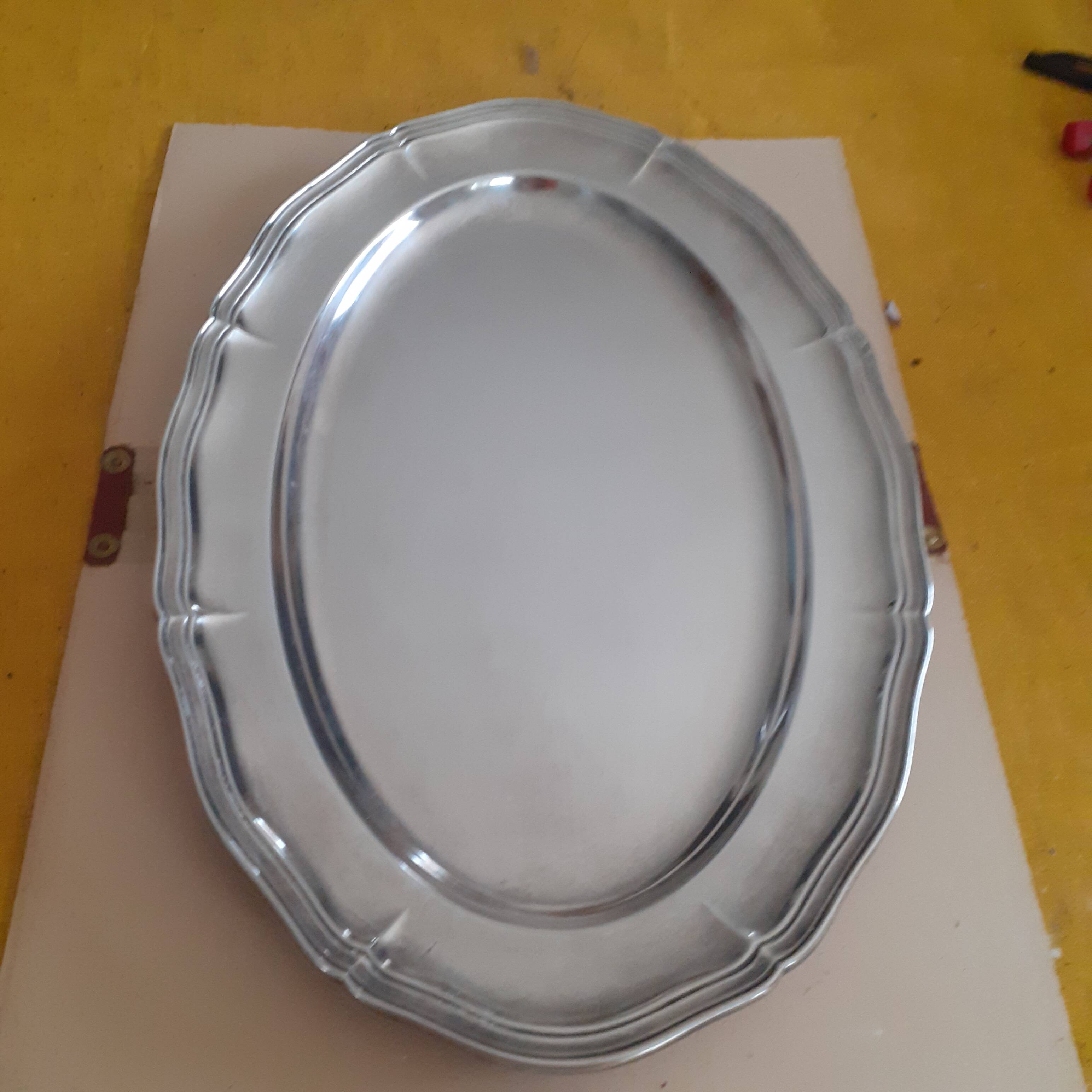 Oval silver metal dish. With initials.