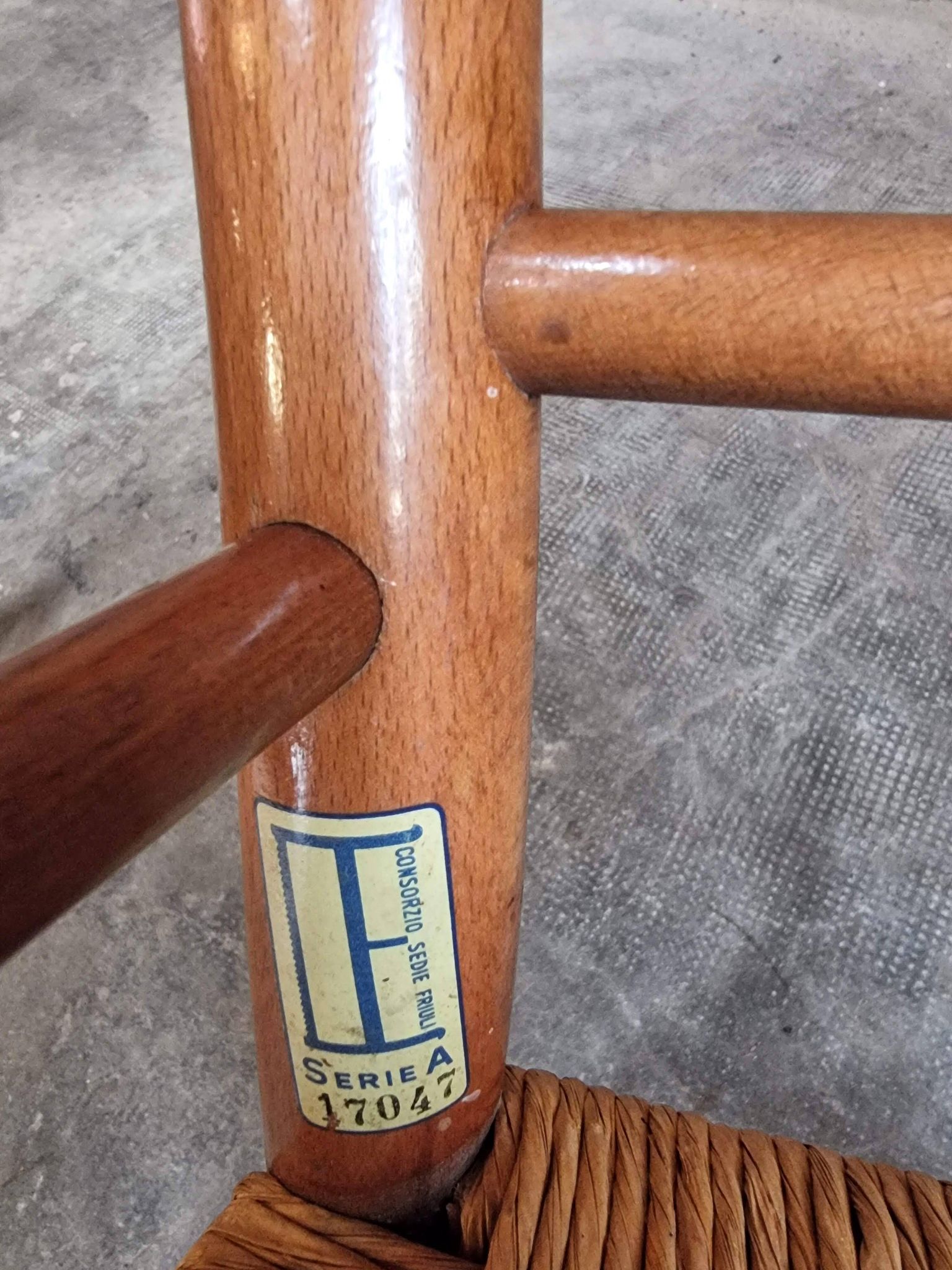 Set of 4 mid-century Italian dining chairs with woven seats, circa 1950–1970.