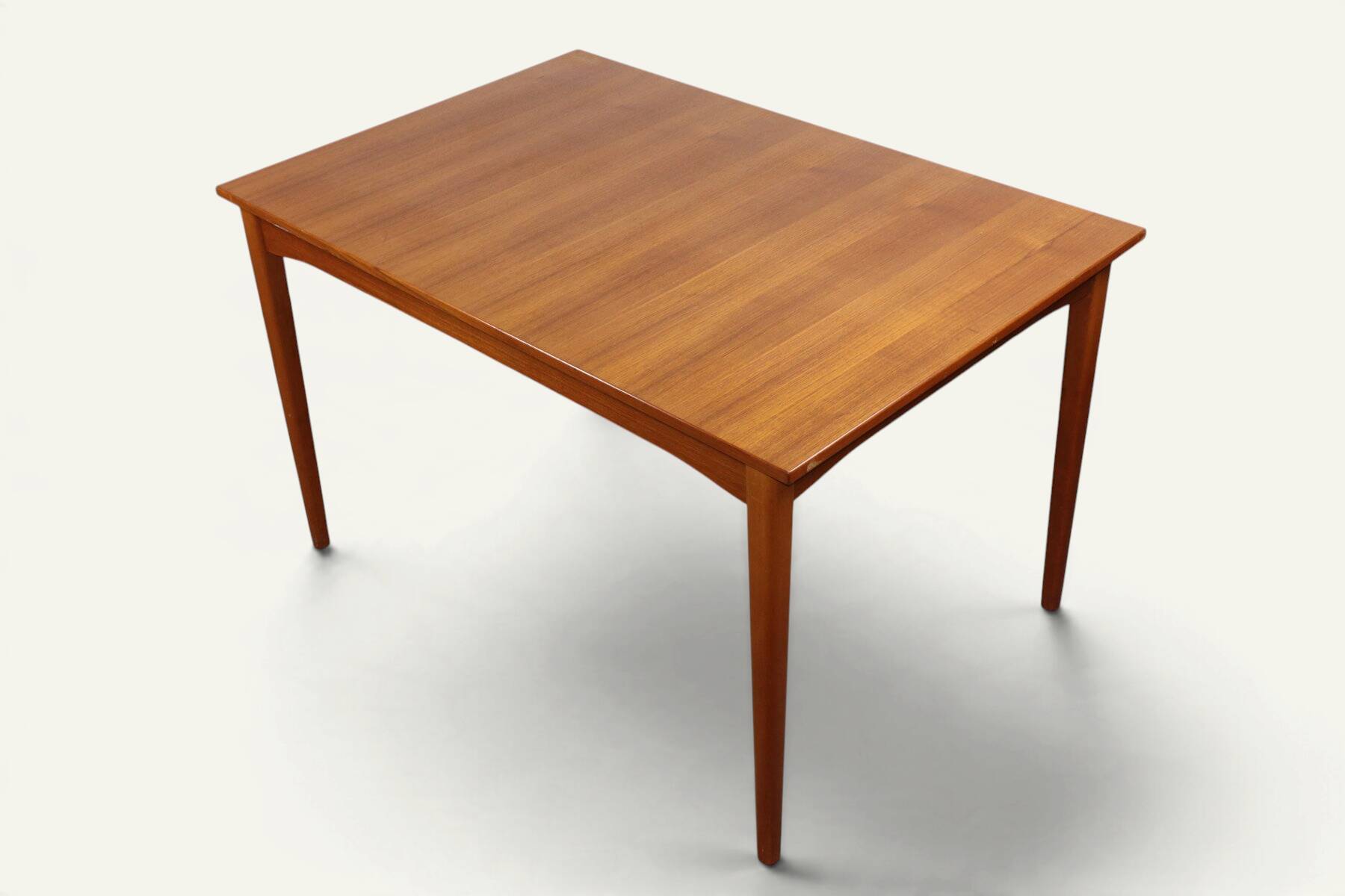 Rectangular extendable dining table in Scandinavian teak – 1960s