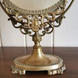 Oval mirror on psyche stand