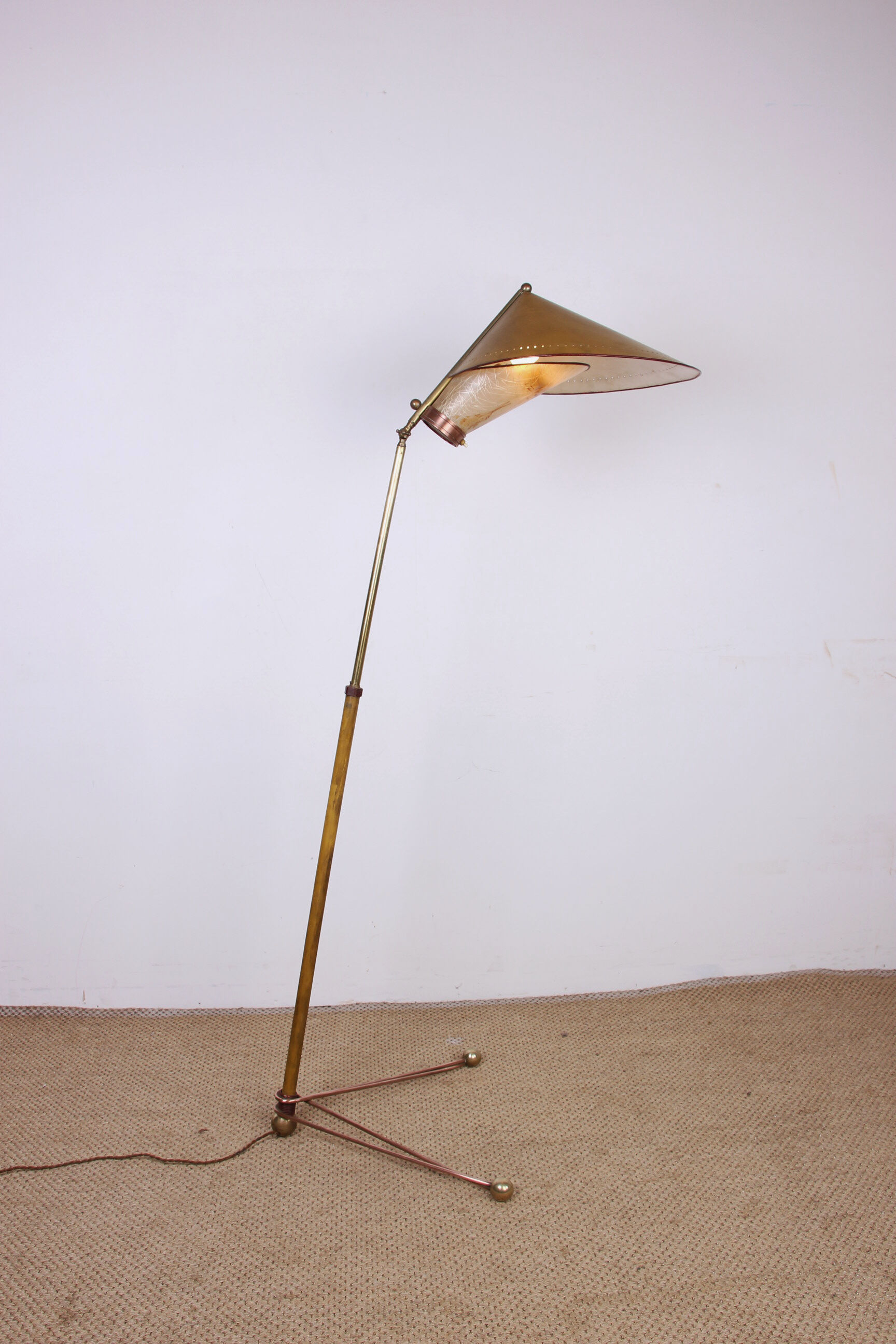 Italian brass floor lamp with conical shaft, adjustable in tilt and height, 1950