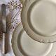 Set of 6 antique off-white porcelain dinner plates with gold trim