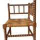 Corner chair in straw and turned wood, fireside chair.