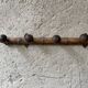 Old wooden wall coat rack
