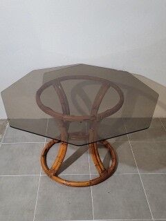 Rattan table and smoked glass