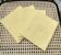 set de 4 serviettes monogrammées EL teintes jaune