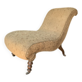 Fauteuil ancien recamier marron en tissu et bois, silhouette S et pieds tournés