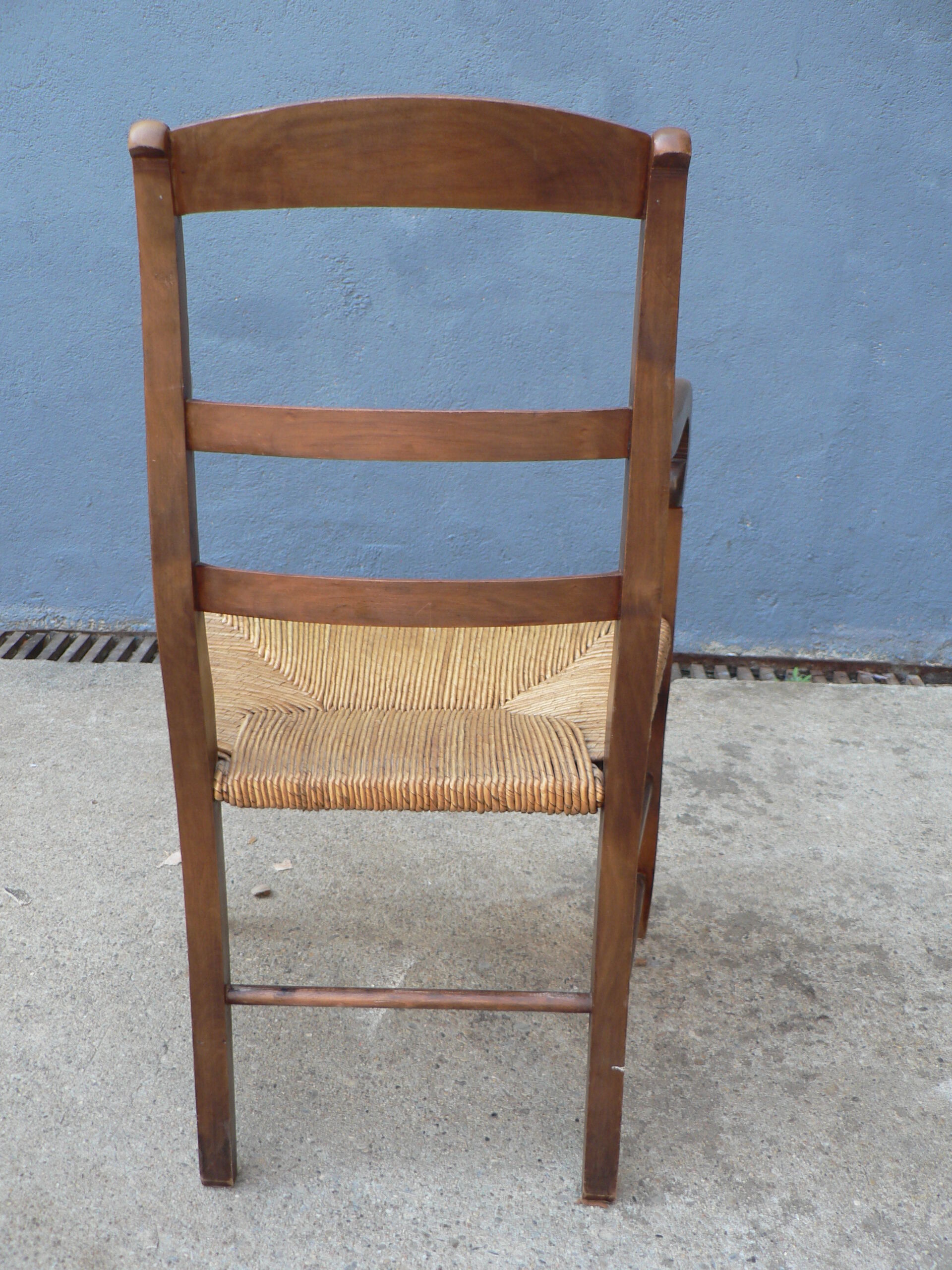 Straw provencal armchair