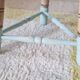 Antique tripod stool with striped seat