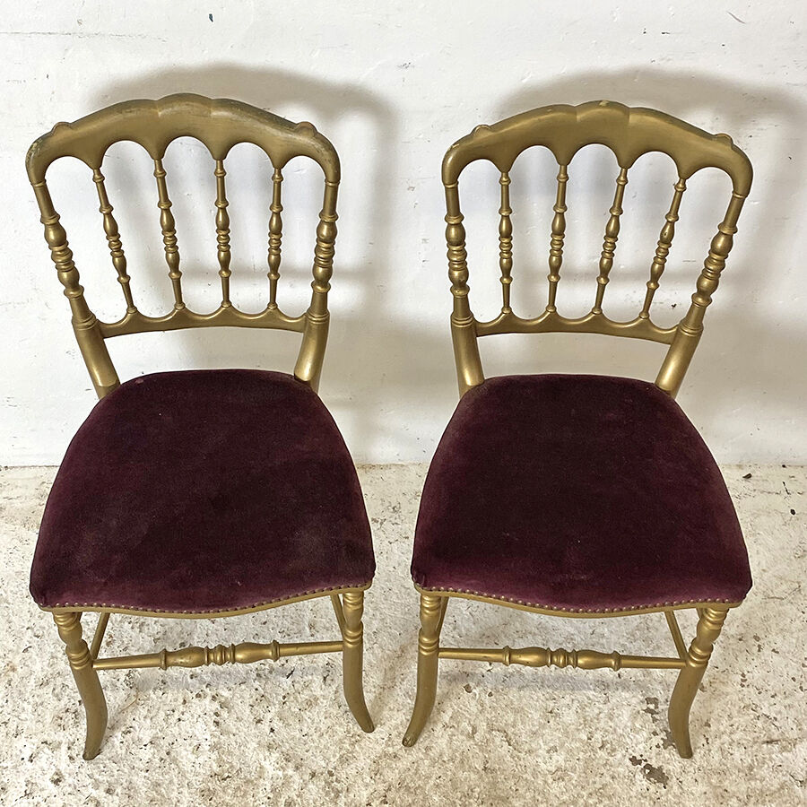 Pair of Charivari chairs in gilded wood