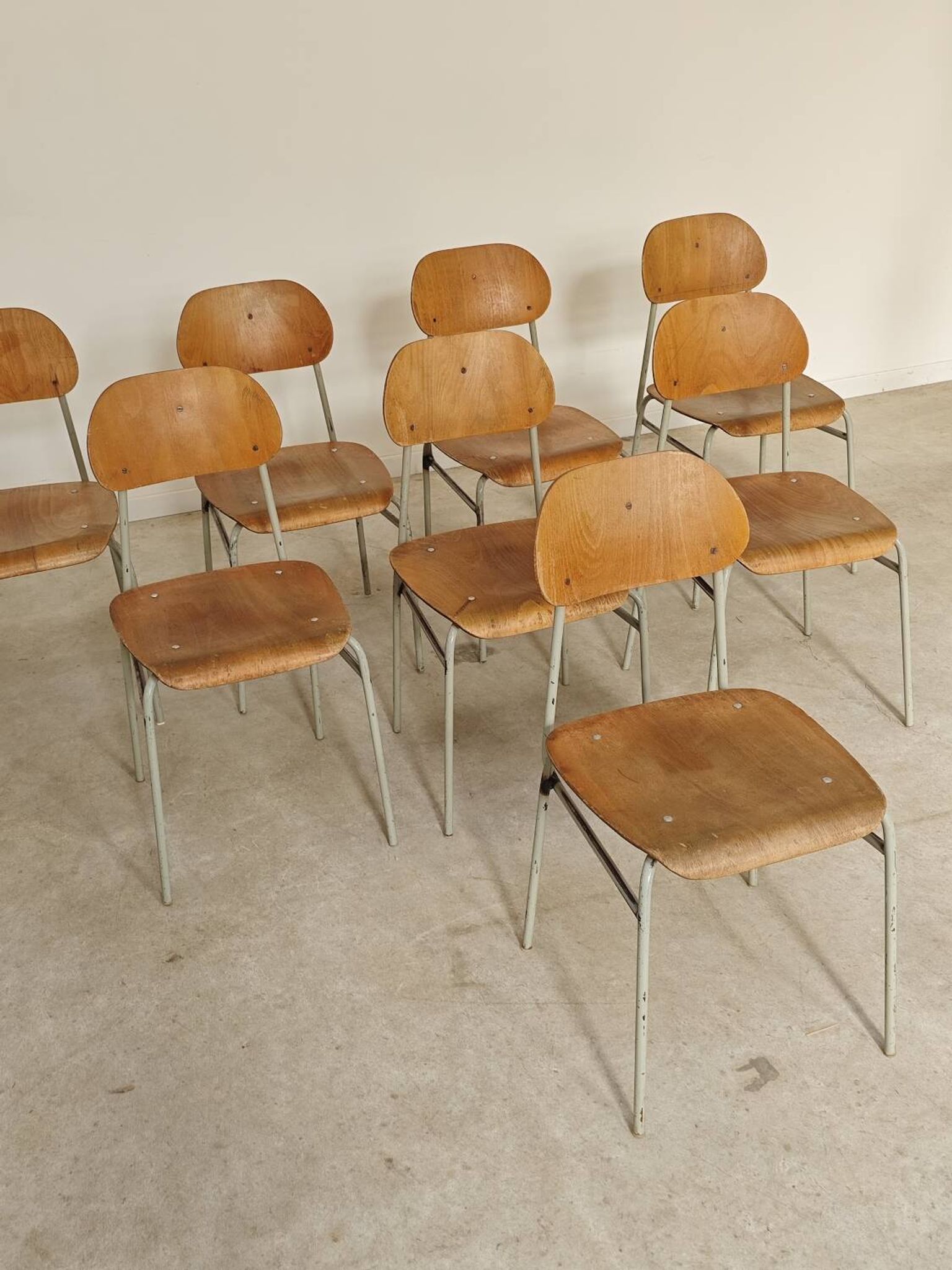Set of 8 metal and wood school chairs  
Ex Czechoslovakia 1960