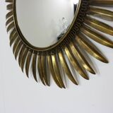 Typical midcentury sunburst wall mirror