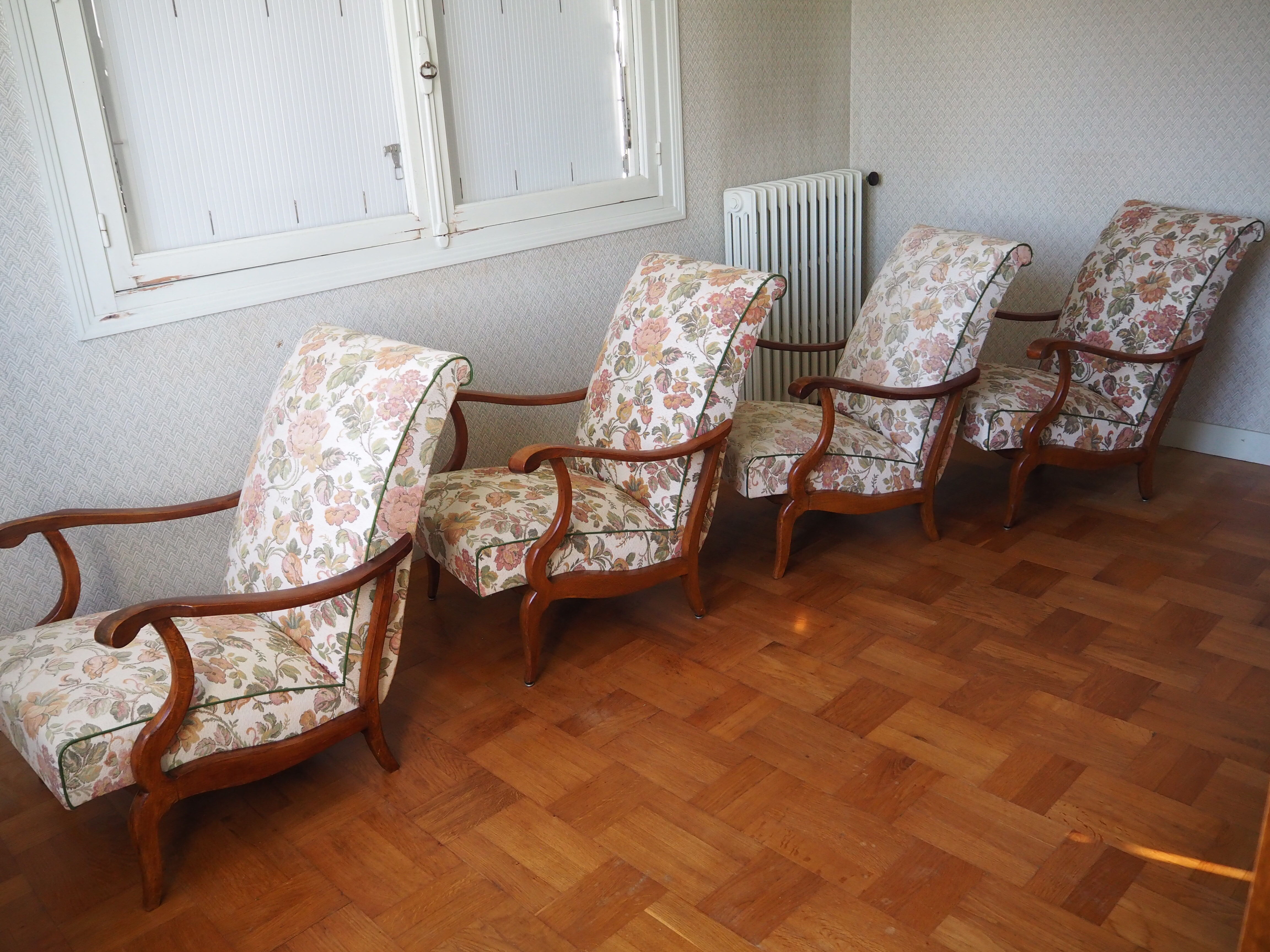 Four 1950s armchairs - wooden armrests