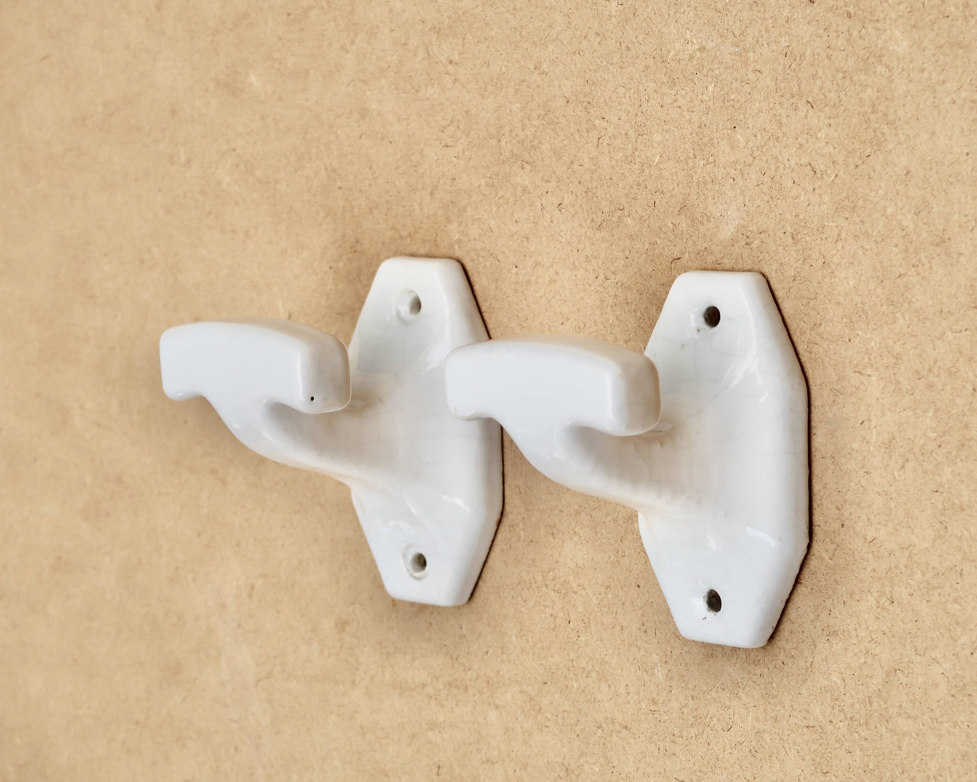 White porcelain coat hooks, 1950s