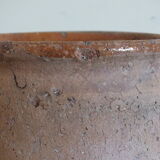 Old grease or honey pot in ochre glazed earth