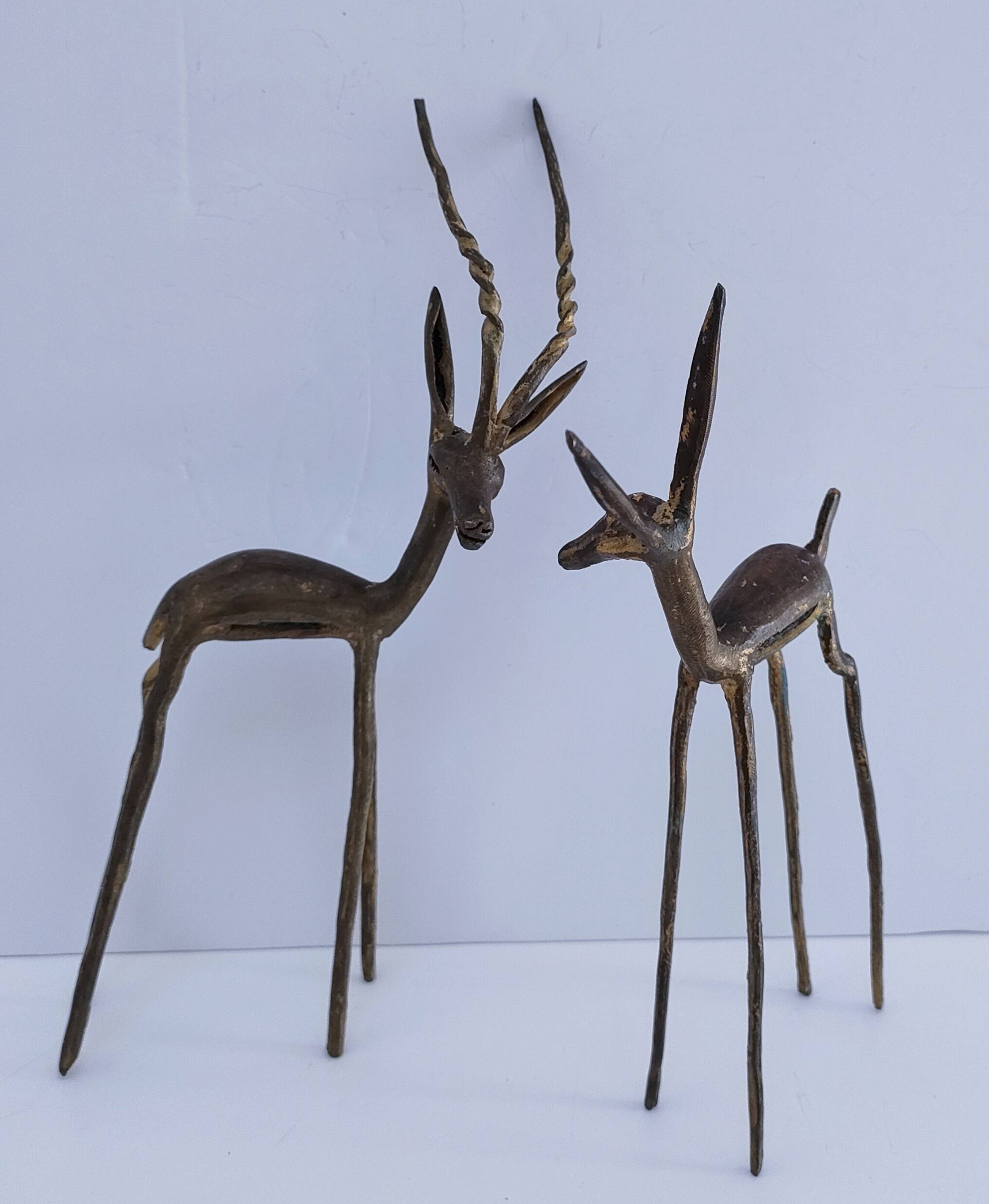 four vintage brass gazelle antelope sculptures