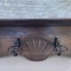 Large antique wall-mounted coat rack in carved wood 135 cm