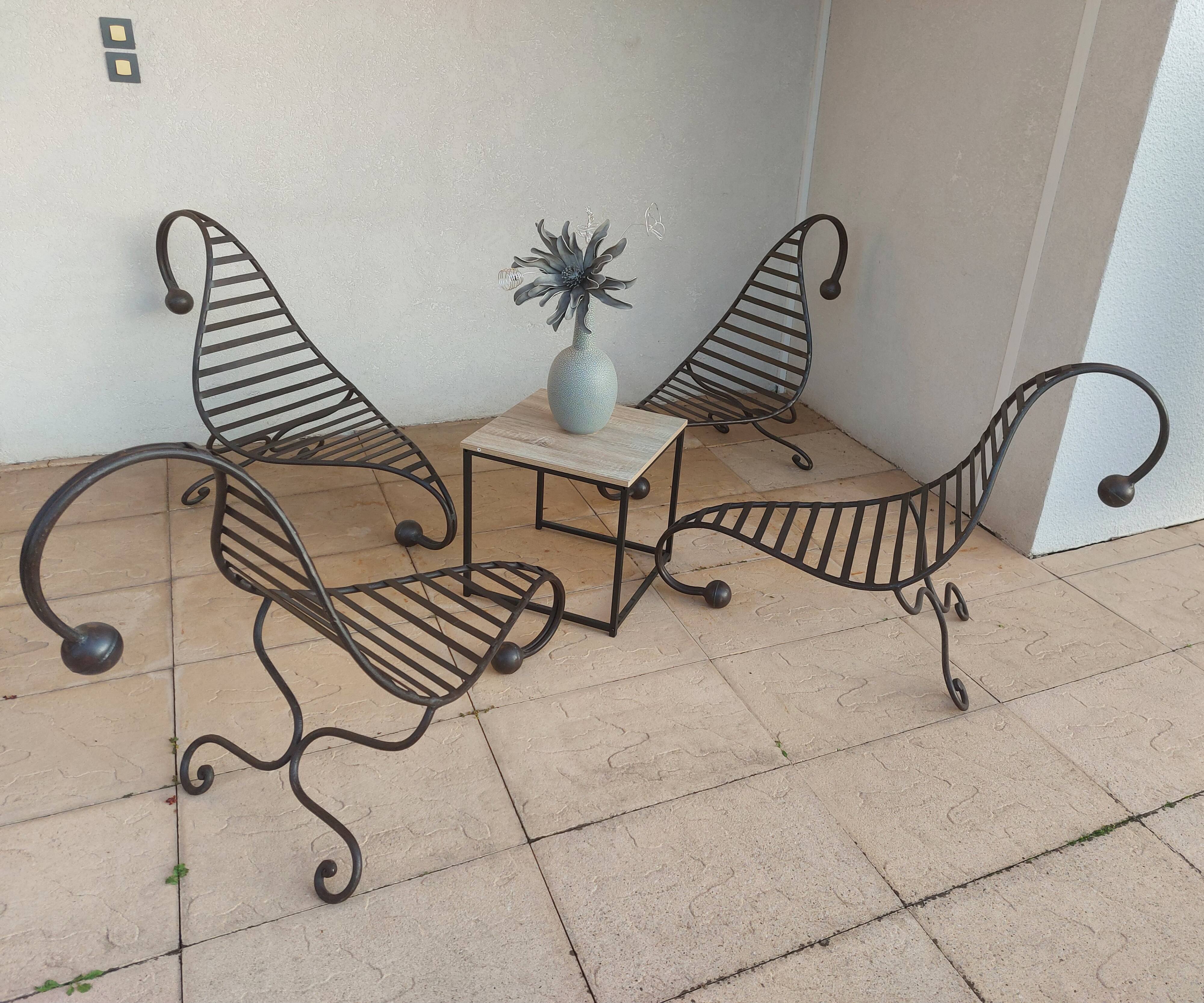 4 wrought iron deck chairs