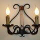 Pair of old antique French double lyre shape green wrought iron wall sconces