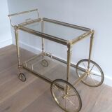 Brass rolling table from the Baguès house.