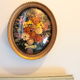 Golden vintage frame with bouquet of dried flowers under globe, wedding bouquet,