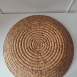 Ethnic plateau in woven palm leaf