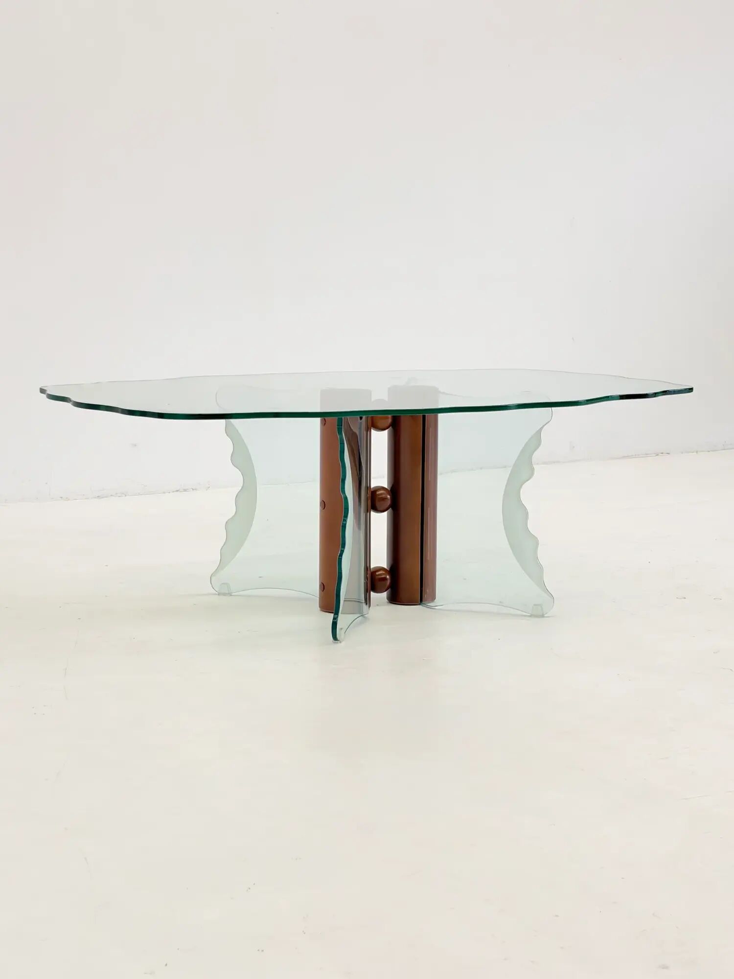 Vintage postmodern coffee table with wavy glass and wooden spheres