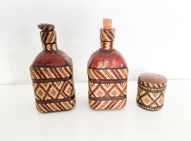 Lot of 2 ethnic leather-wrapped bottles and box