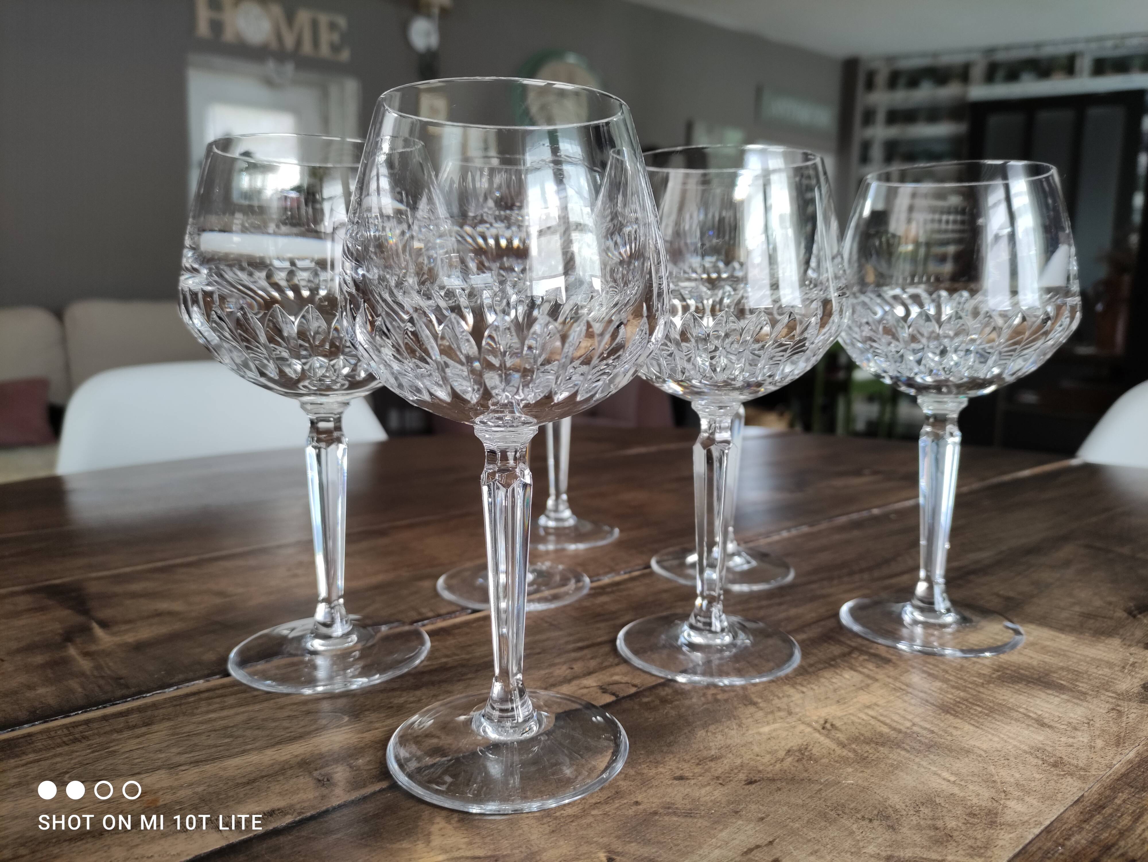 Set of 7 cut crystal wine glasses