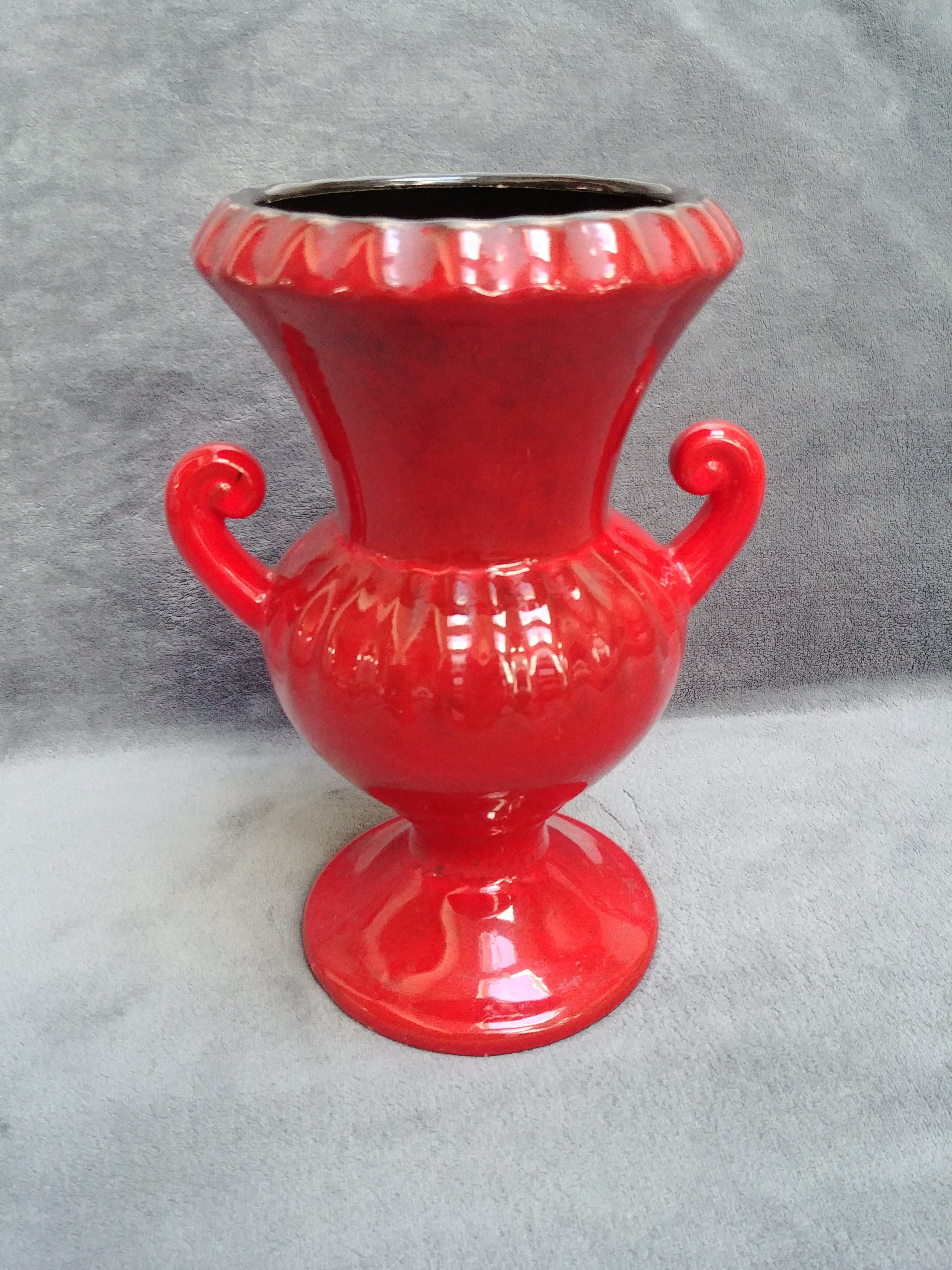 Very pretty red ceramic vase with black highlights with two handles