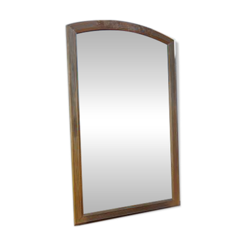 Bevelled wooden and gilded stucco mirror from the 19th century.