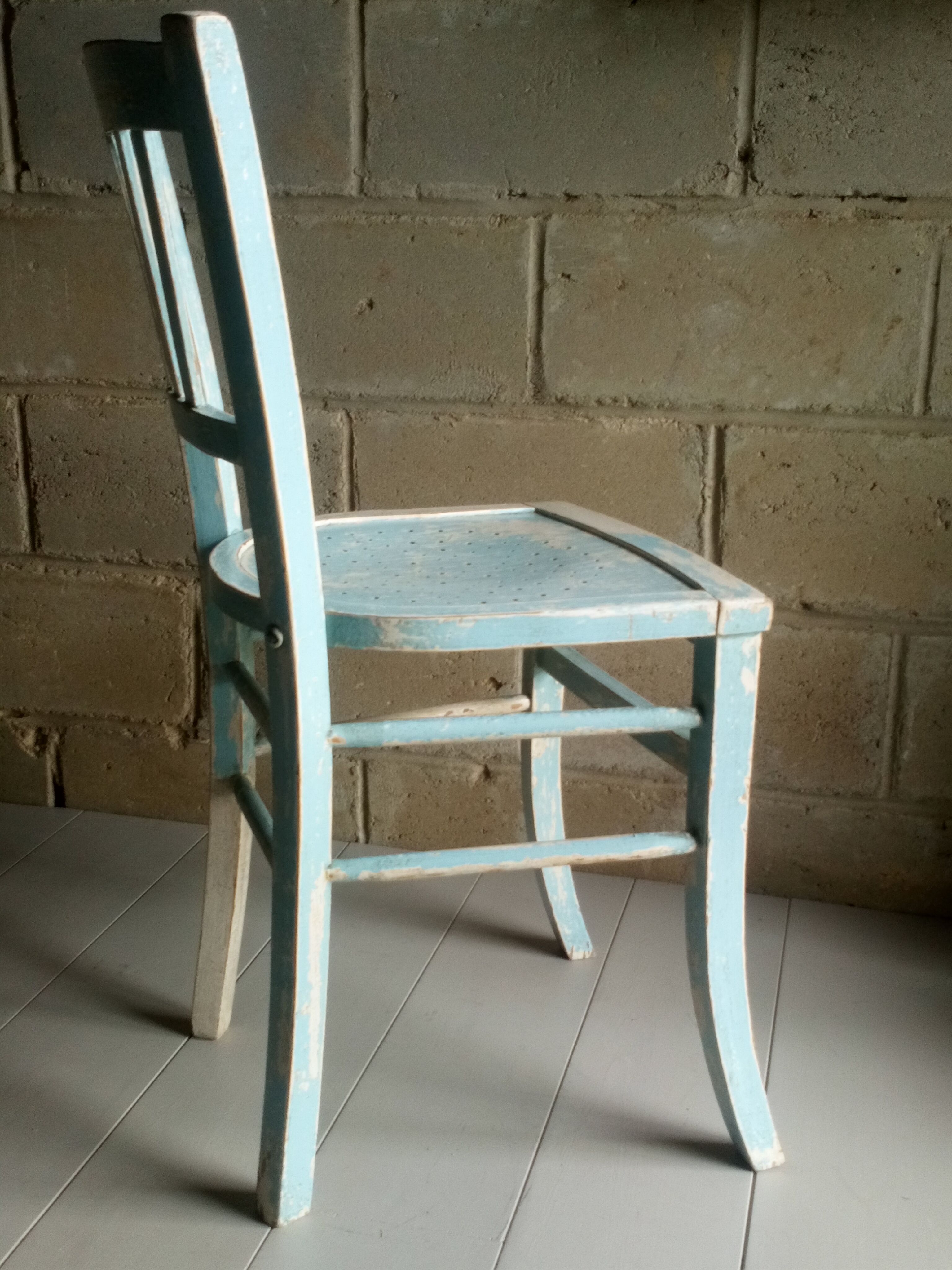 Blue and white patinated old bistro chair