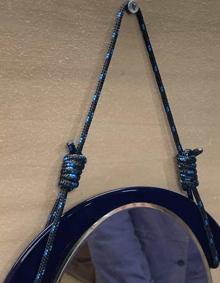 Small round wall mirror in dark blue bakelite 1960