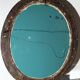 Oval mirror on an 18th century frame