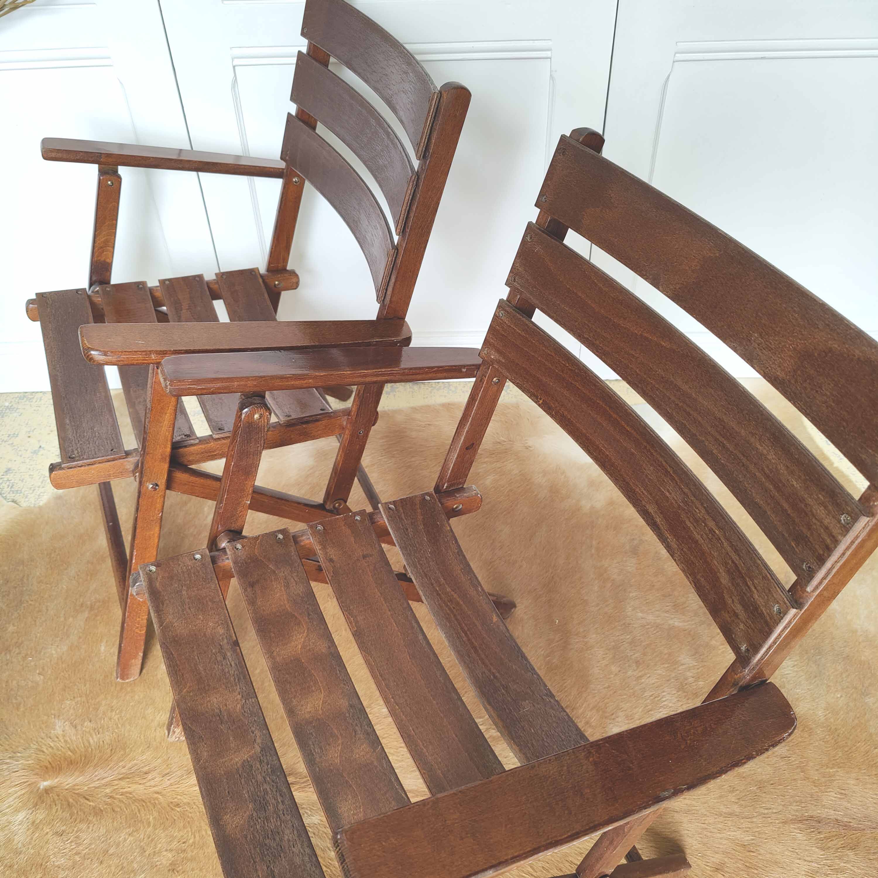 Pair of folding wooden armchairs