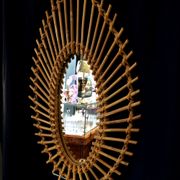 Oval shaped sun mirror in vintage rattan 1960/1970