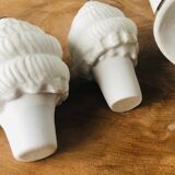 2 bottles in antique biscuit porcelain