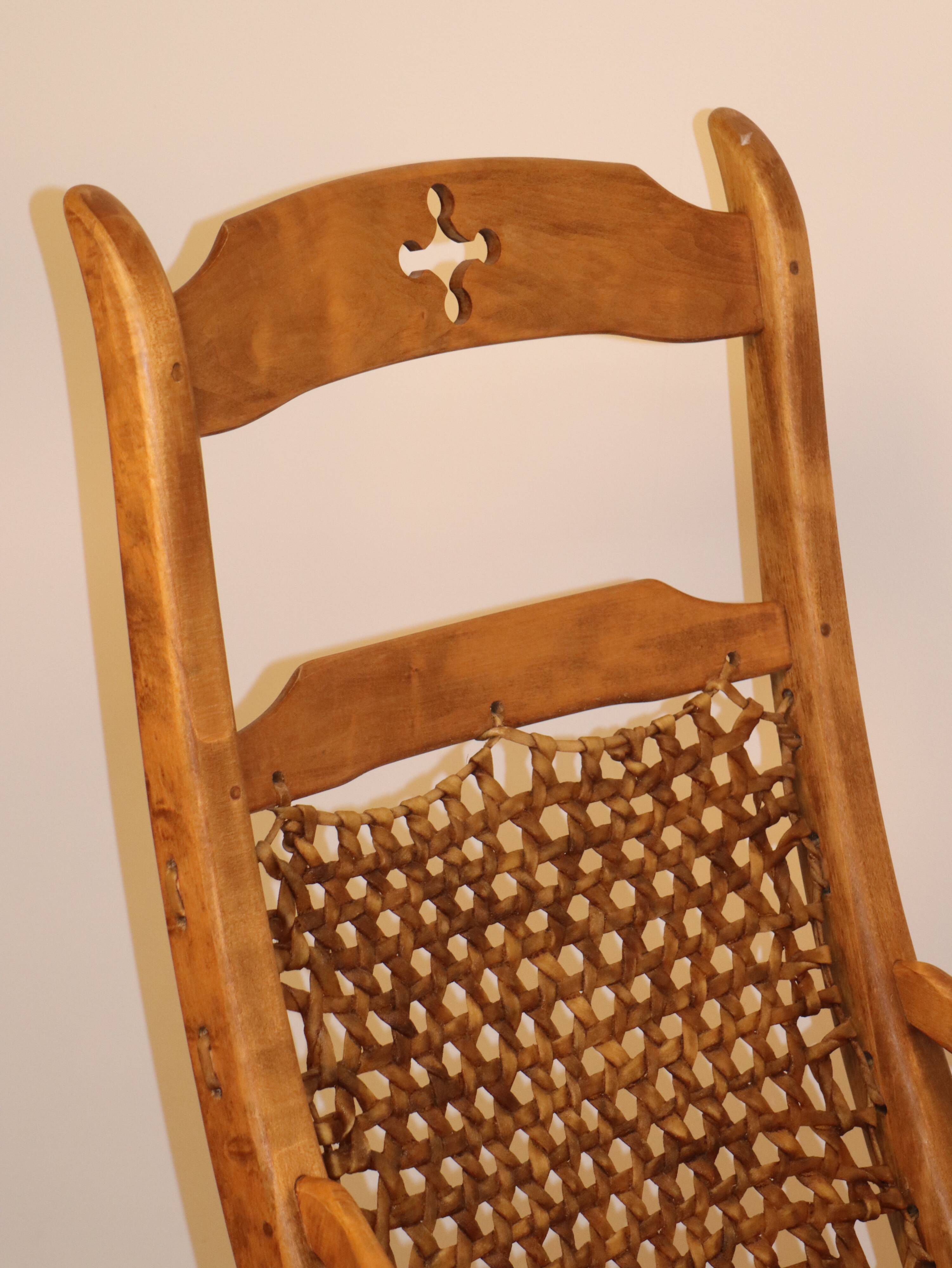 Vintage rocking chair in solid wood 1950