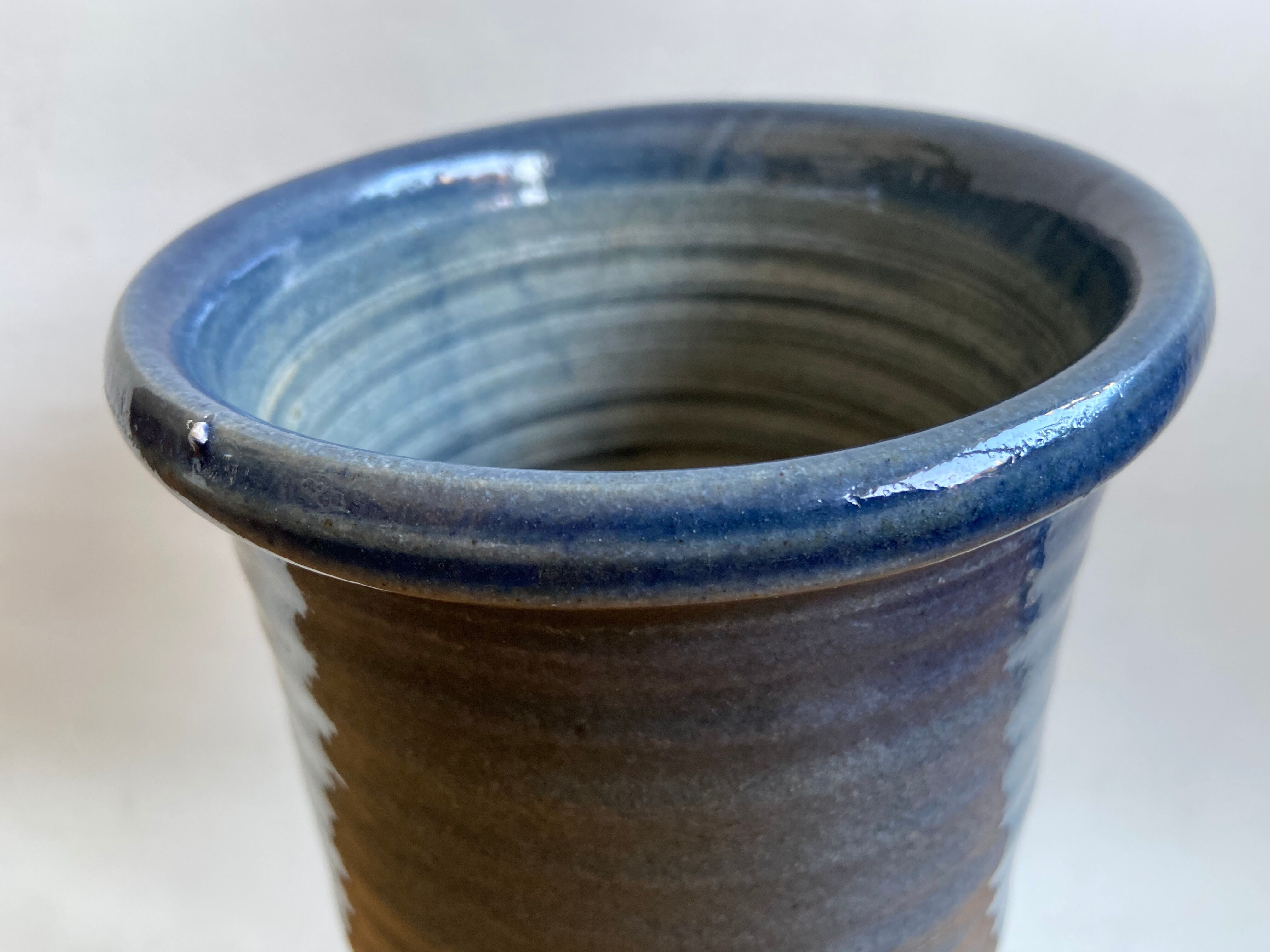 Blue enamelled sandstone vase