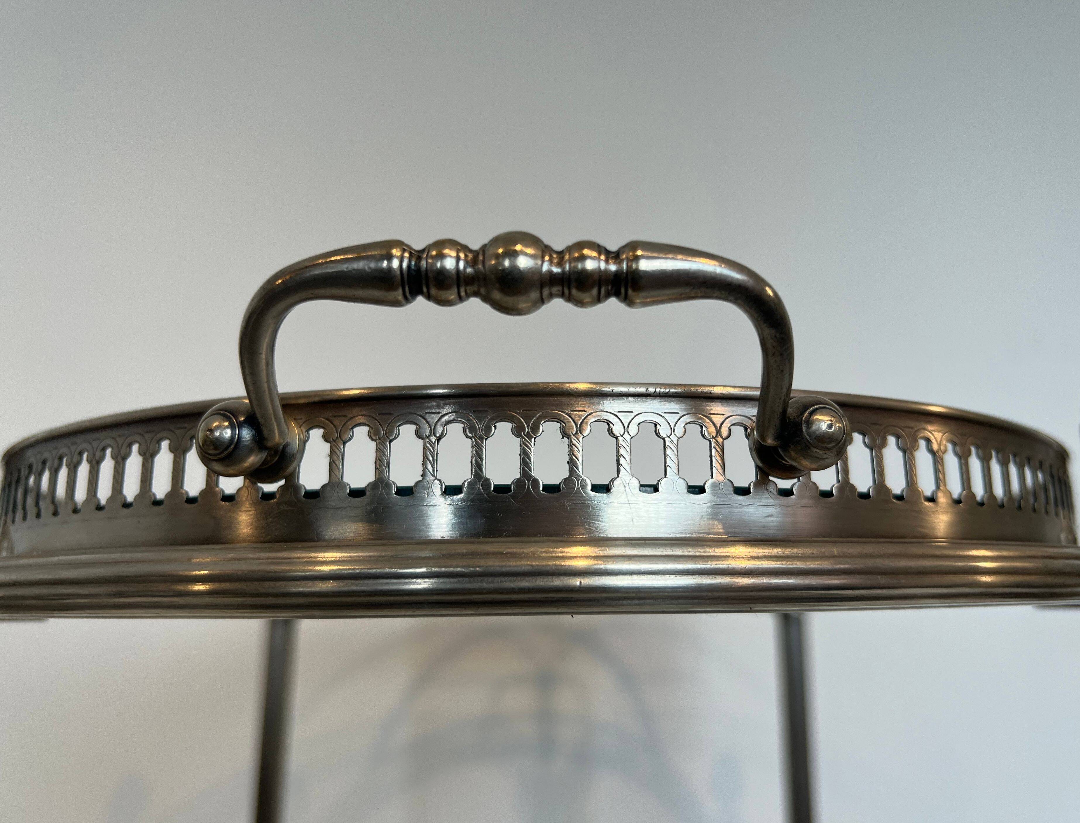Oval silver-plated brass trolley from Maison Baguès.
